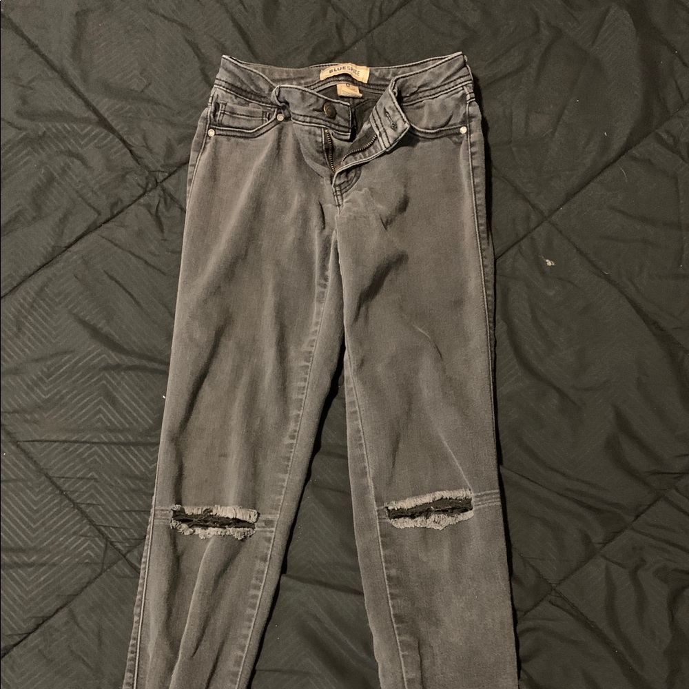 Black holy jeans.